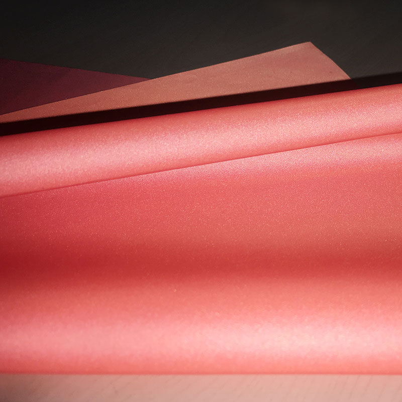 柔軟滌絲紡橘色反光布